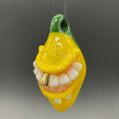 Grinning lemon pendant