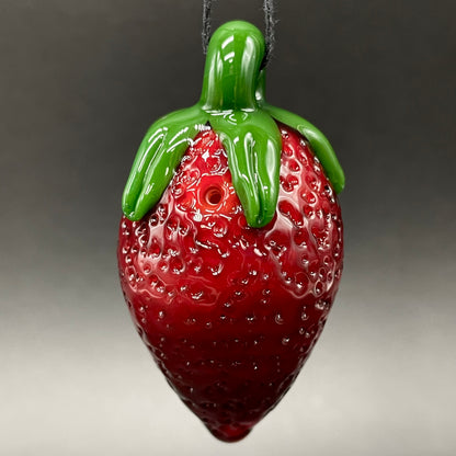 Toothy strawberry pendant