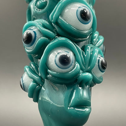 The Never-Blinking One glass effigy pendant