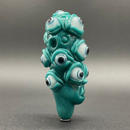 The Never-Blinking One glass effigy pendant