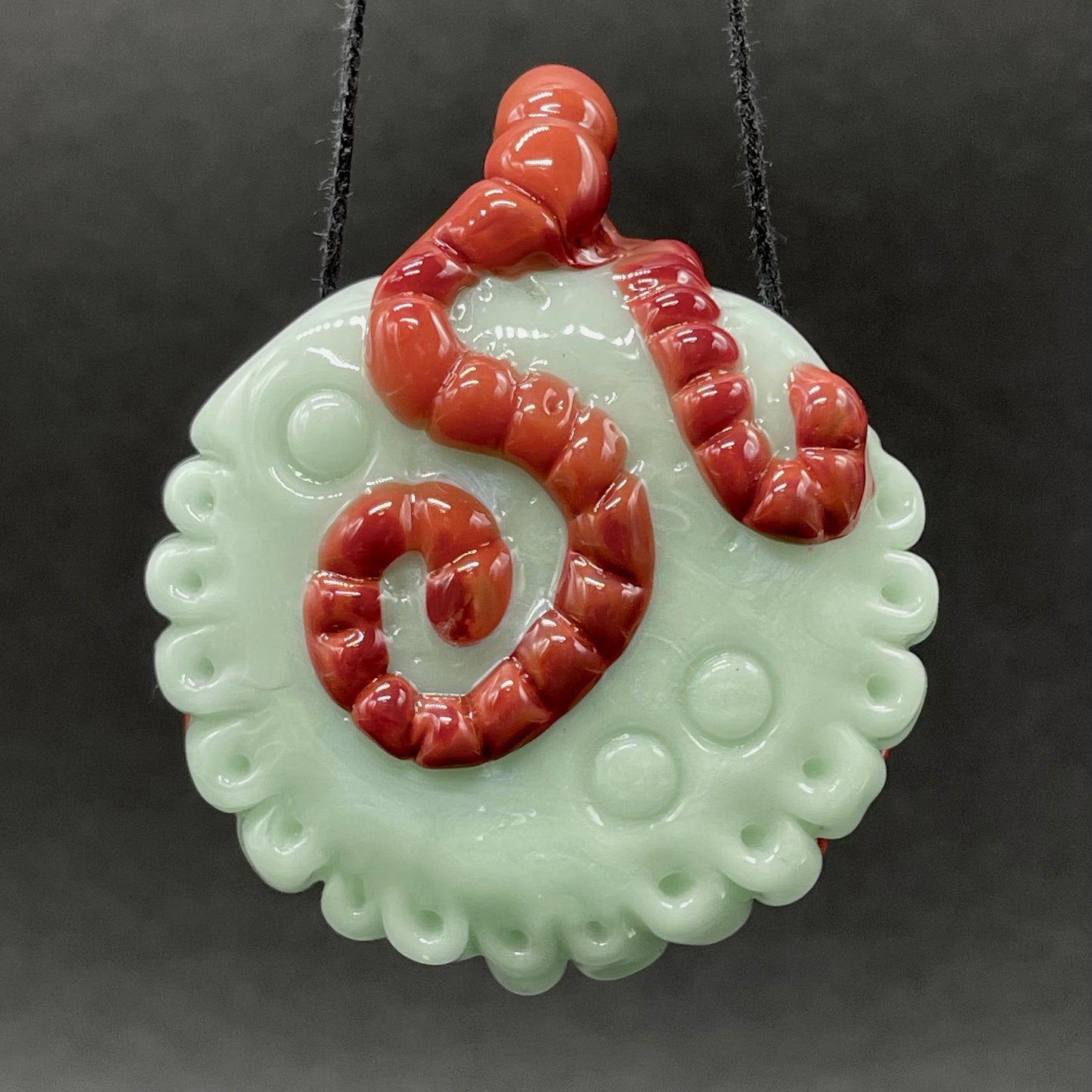 Worm eater pendant