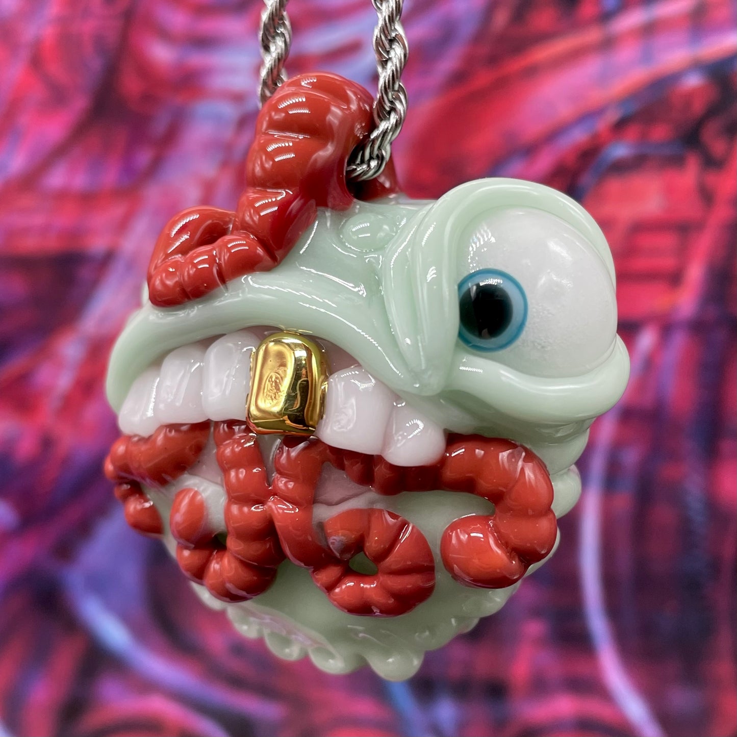 Worm eater pendant