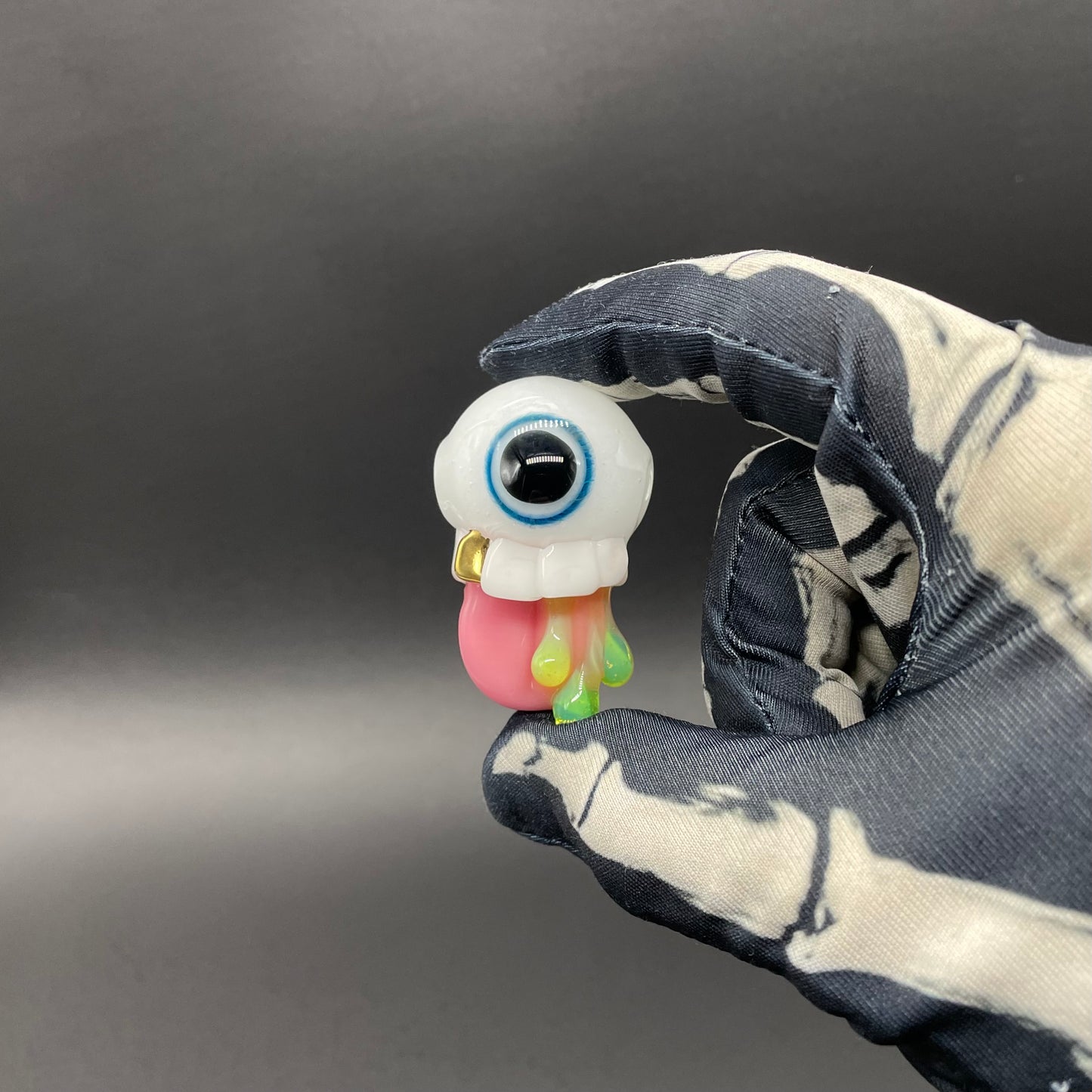 Glow in the dark eye pendant