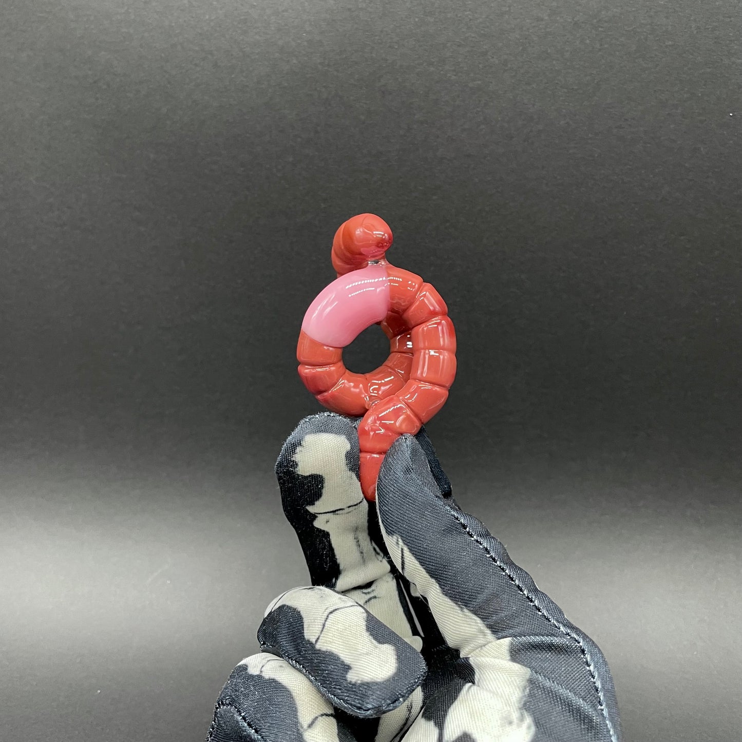 glass earthworm pendant