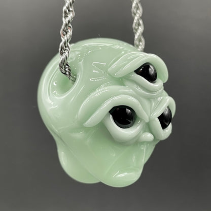 Time manipulating three eye glass alien pendant