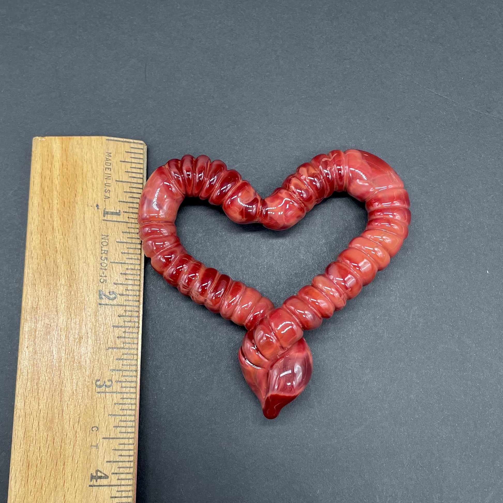 Hand-blown Large glass earthworm heart shaped pendant - Leviathan Glass original