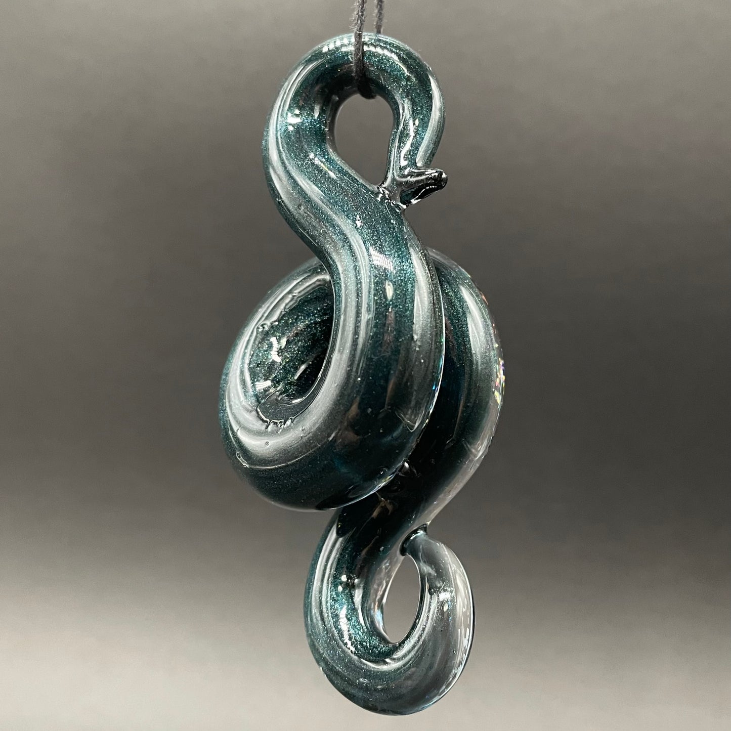 Dichroic sparkle snake pendant