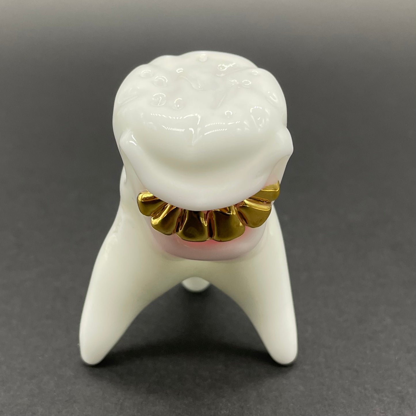 Tooth ache glass pendant