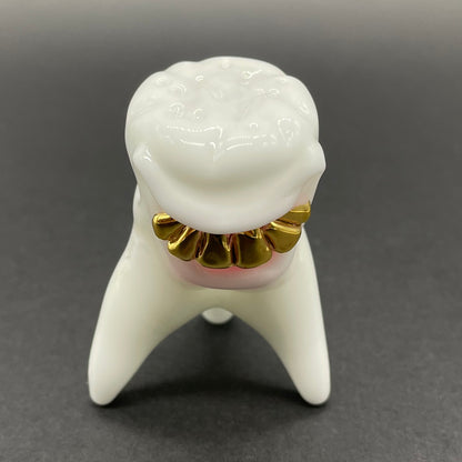 Tooth ache glass pendant