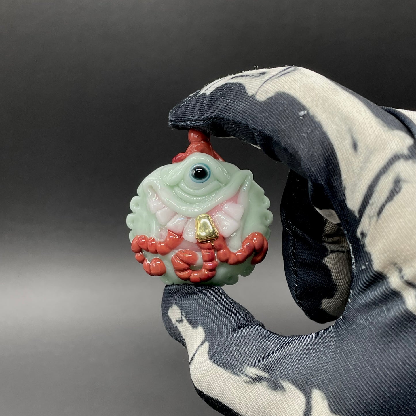 Worm eater pendant