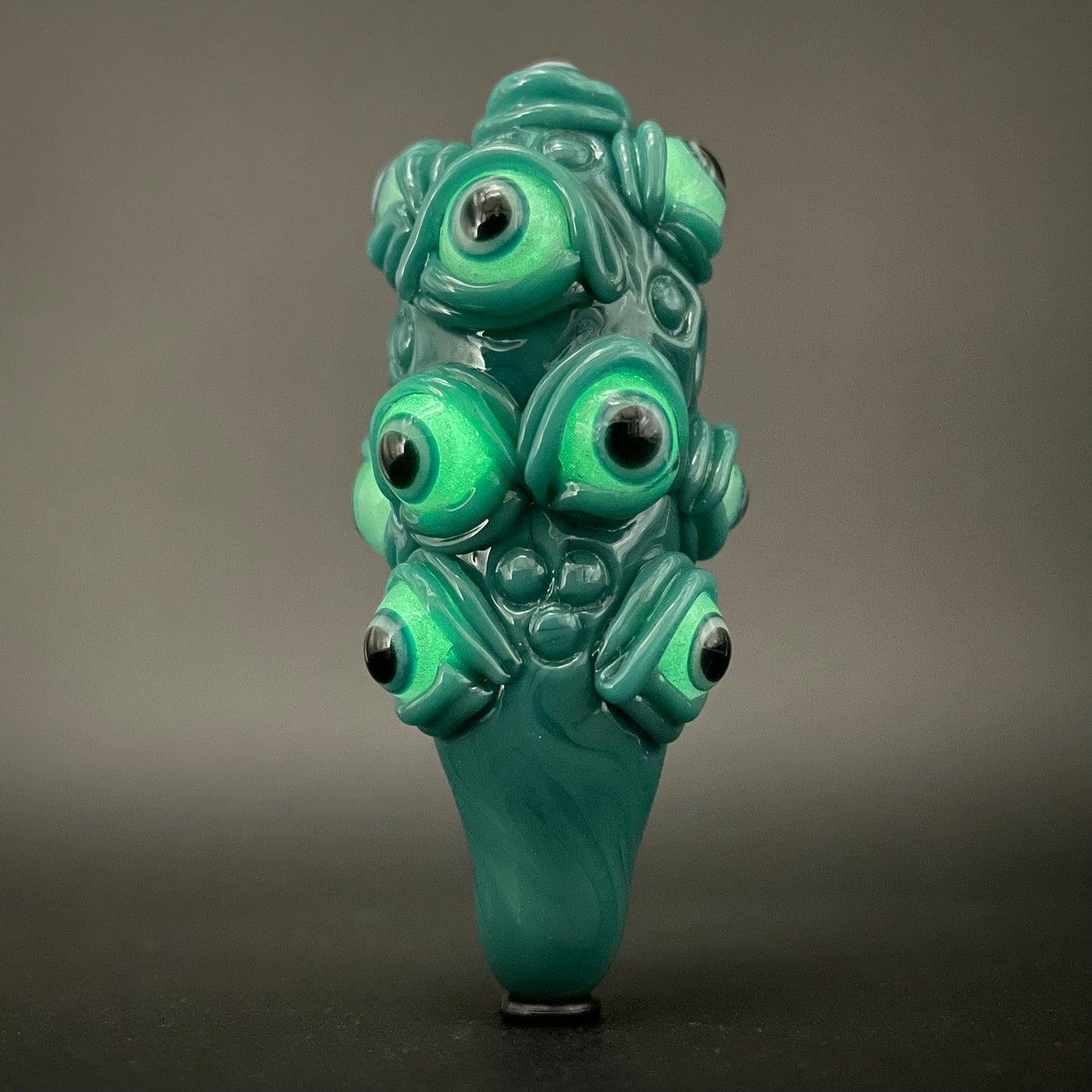 The Never-Blinking One glass effigy pendant