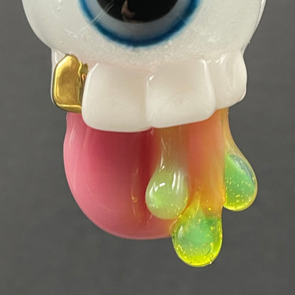 Glow in the dark eye pendant