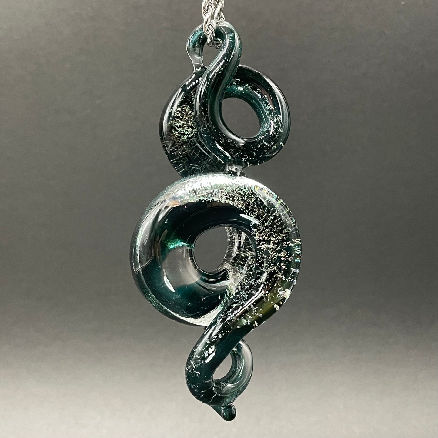Dichroic sparkle snake pendant