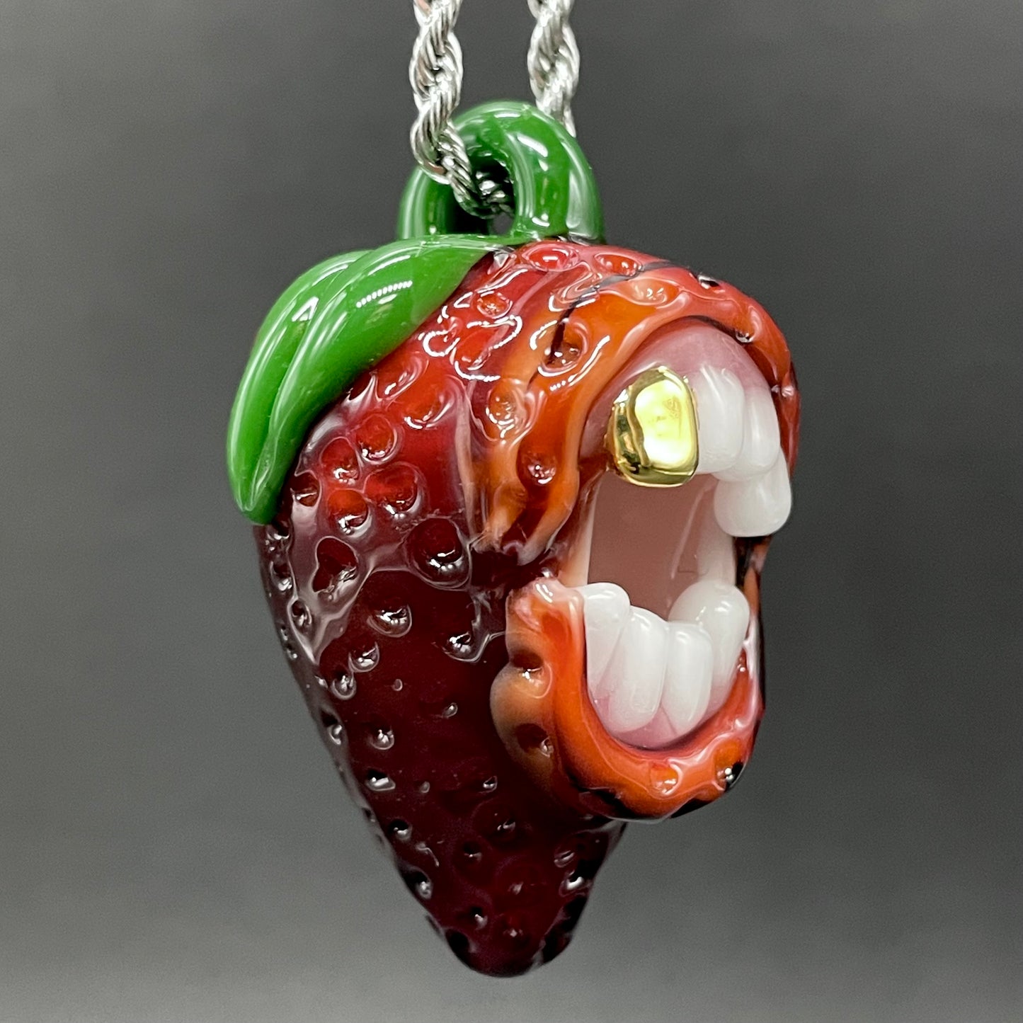 Screaming strawberry glass pendant
