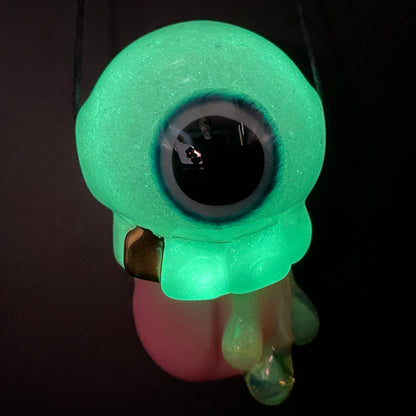Glow in the dark eye pendant