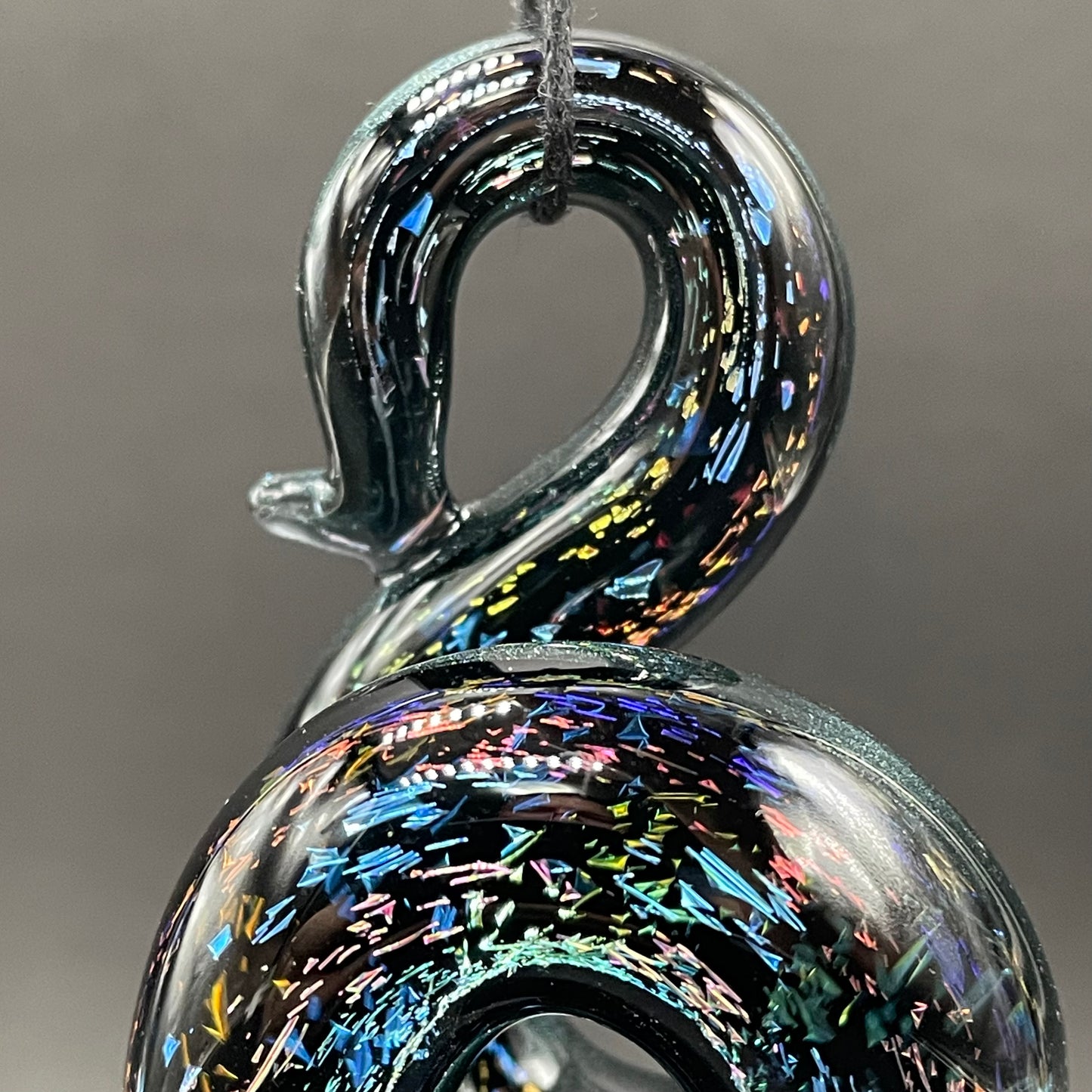 Dichroic sparkle snake pendant