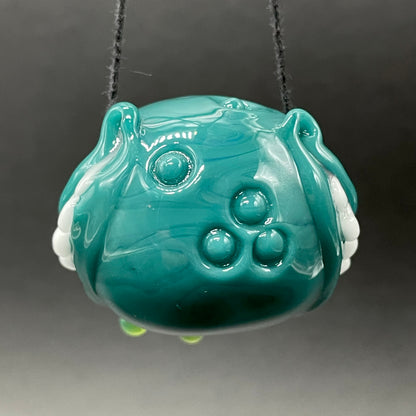 Grinning like a fool glass pendant