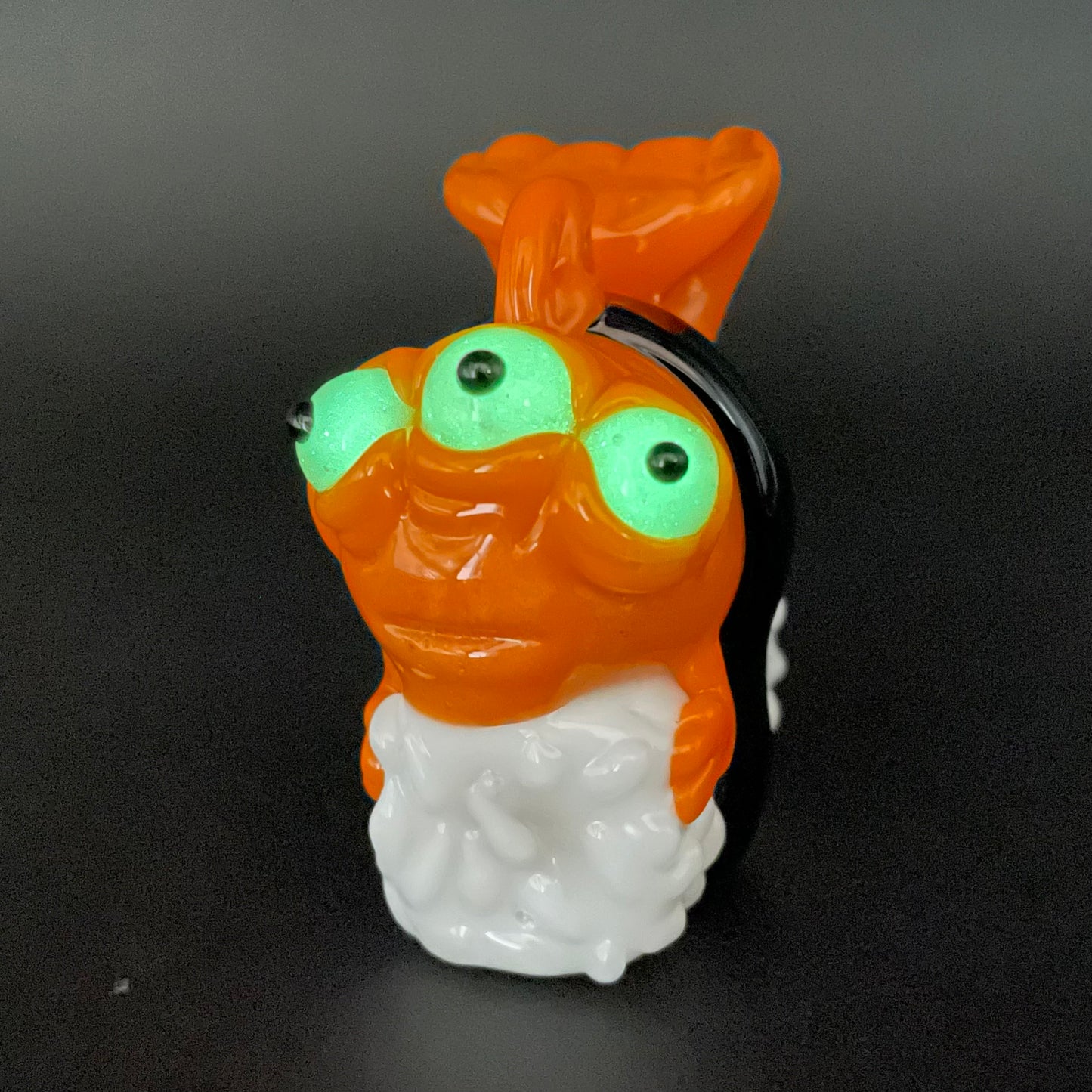 Mutant three eyed fish sushi glass pendant