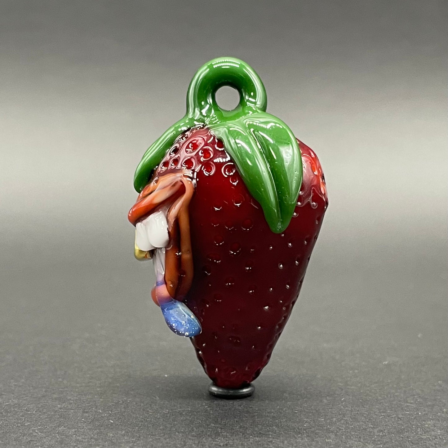 Toothy strawberry pendant