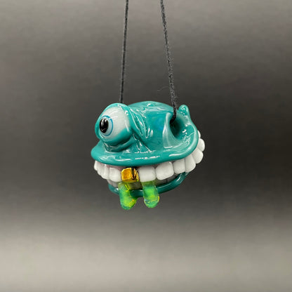 Grinning like a fool glass pendant