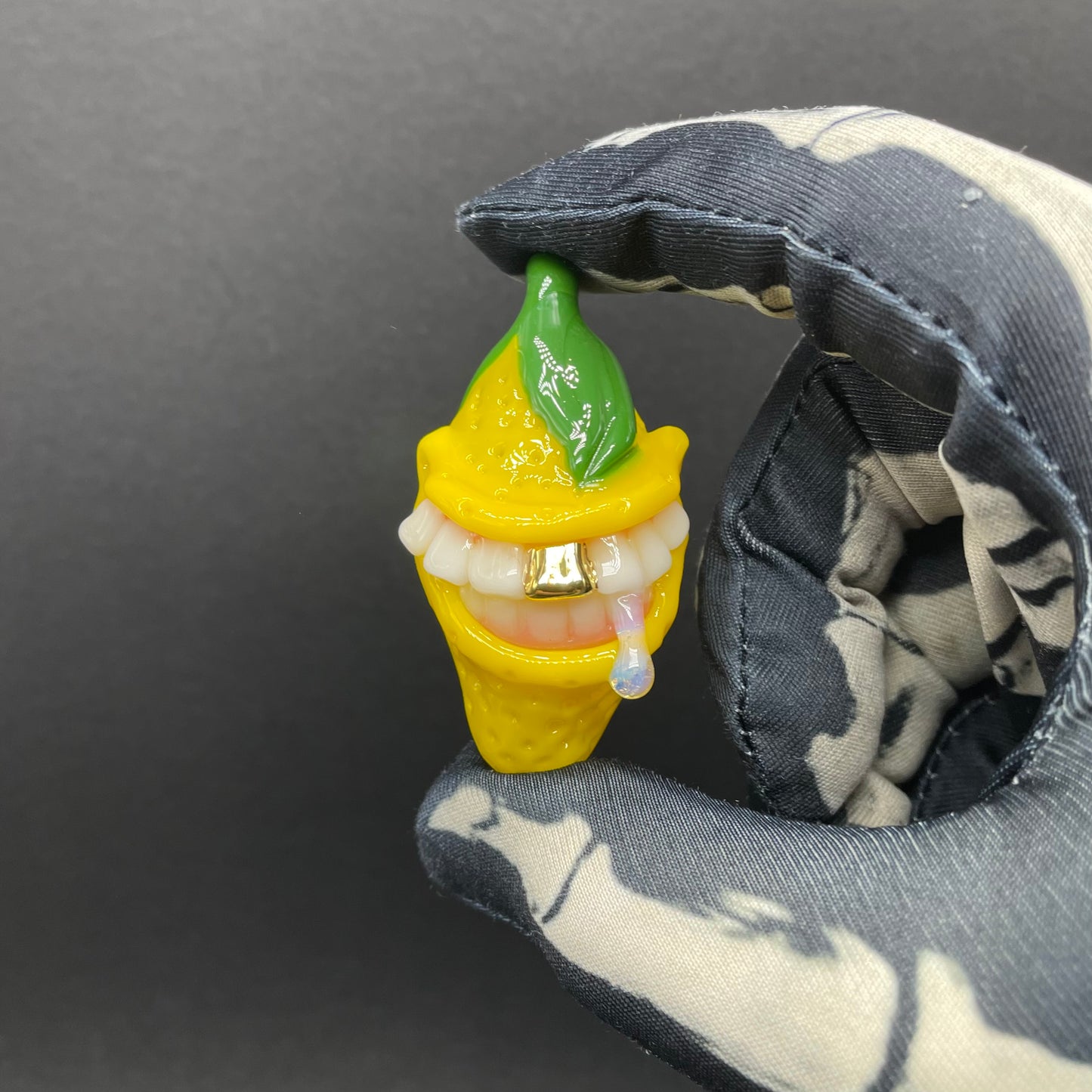 Grinning lemon pendant