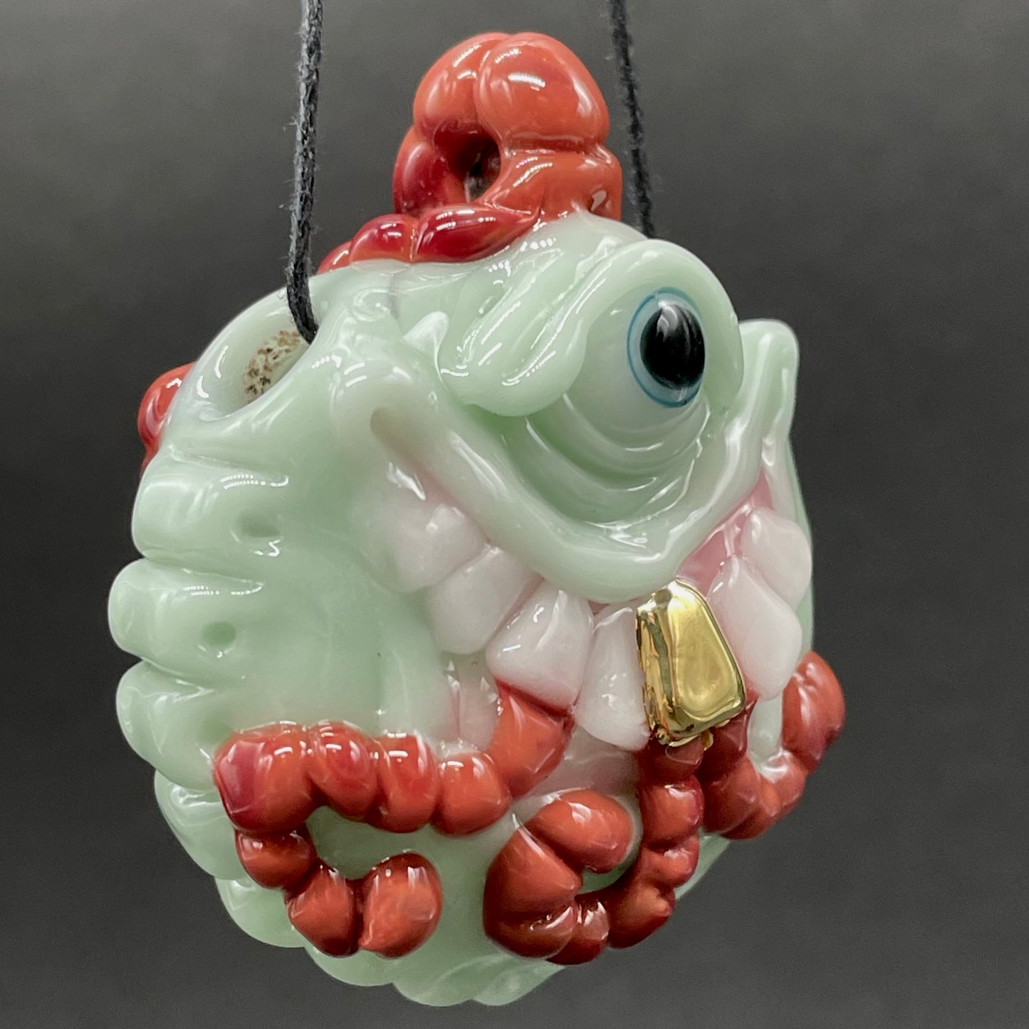 Worm eater pendant