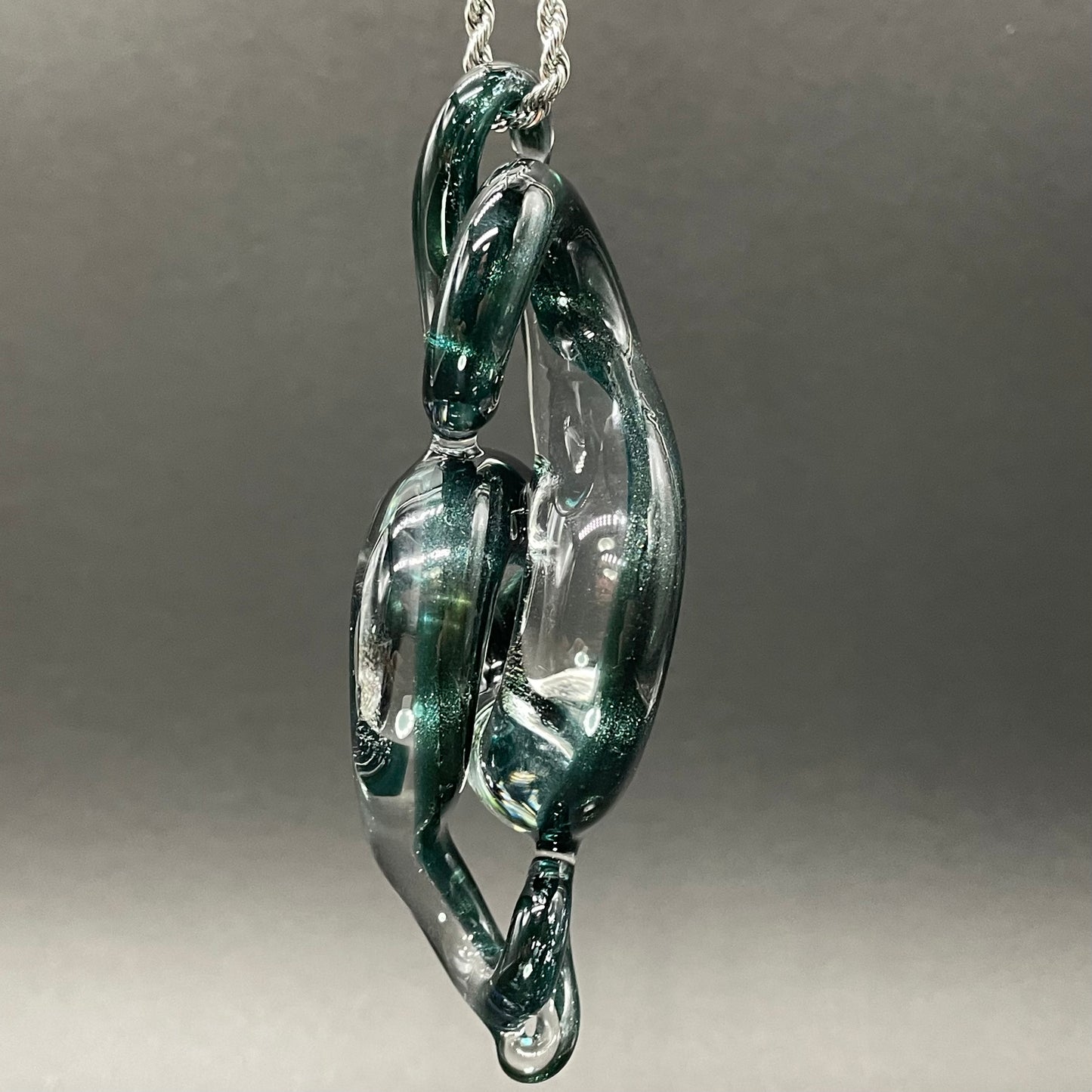 Dichroic sparkle snake pendant