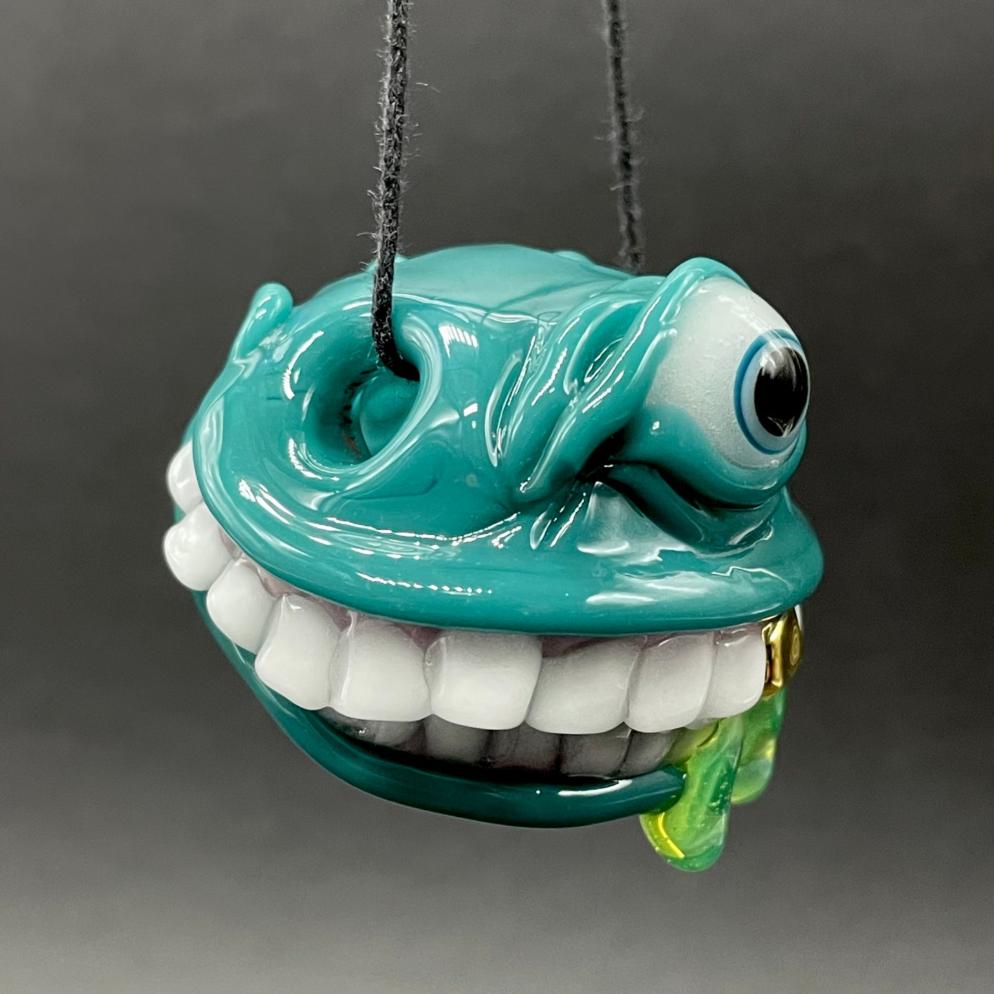 Grinning like a fool glass pendant