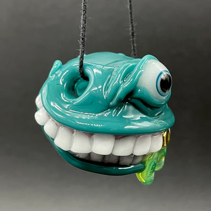 Grinning like a fool glass pendant