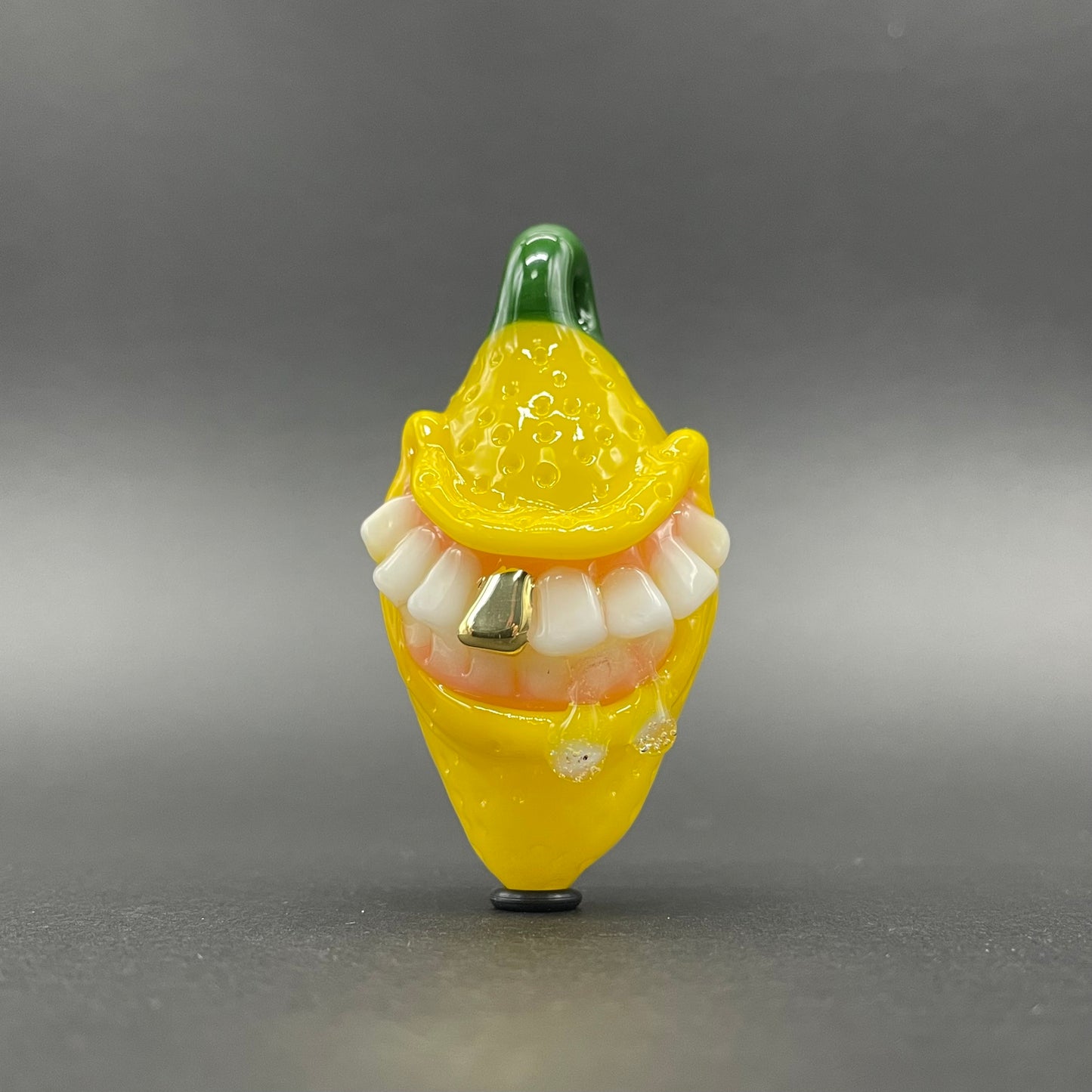 Grinning lemon pendant