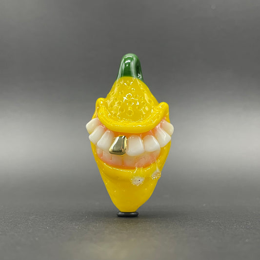 Grinning lemon pendant