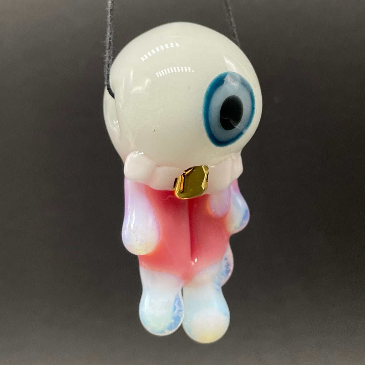 Glow in the dark eye pendant