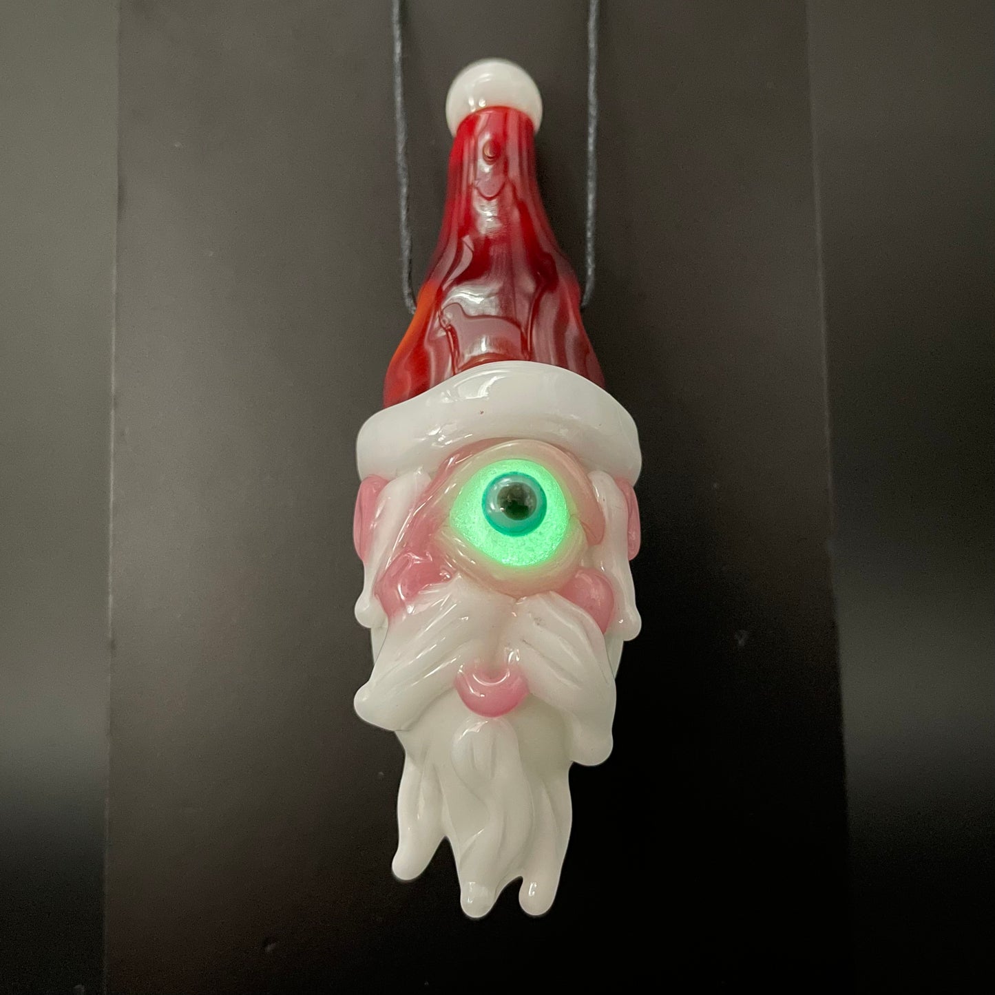 Cyclops Santa glass pendant