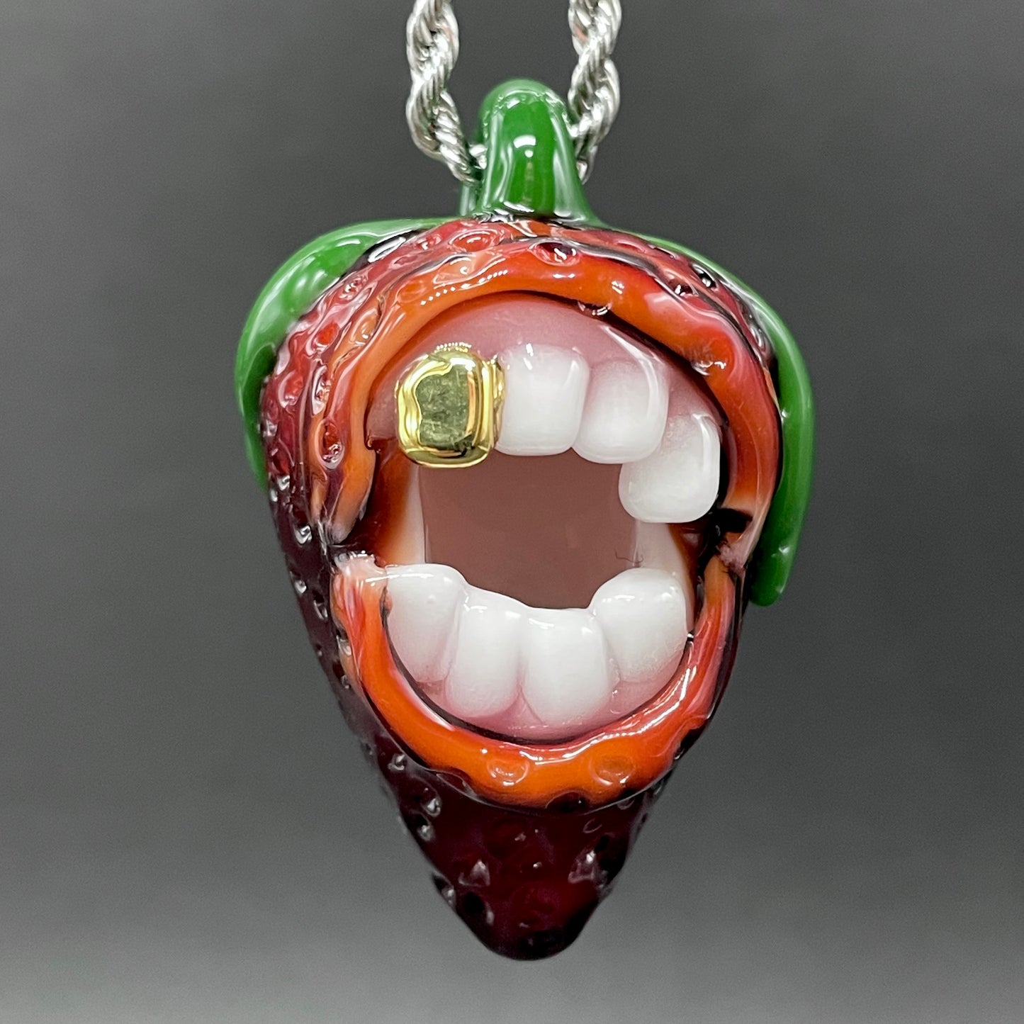 Screaming strawberry glass pendant