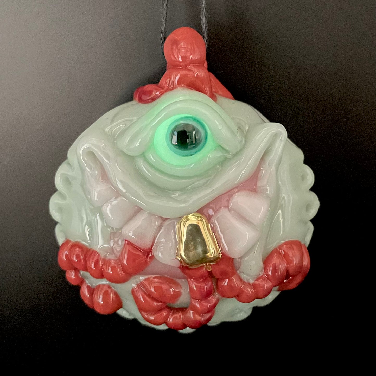 Worm eater pendant