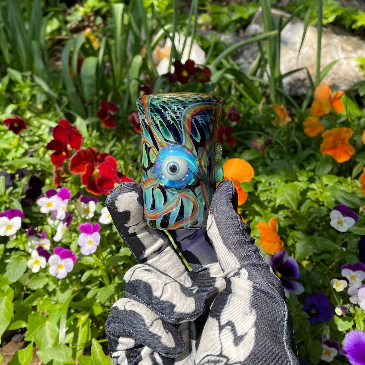 Rainbow cyclops plant pot with drainage holes