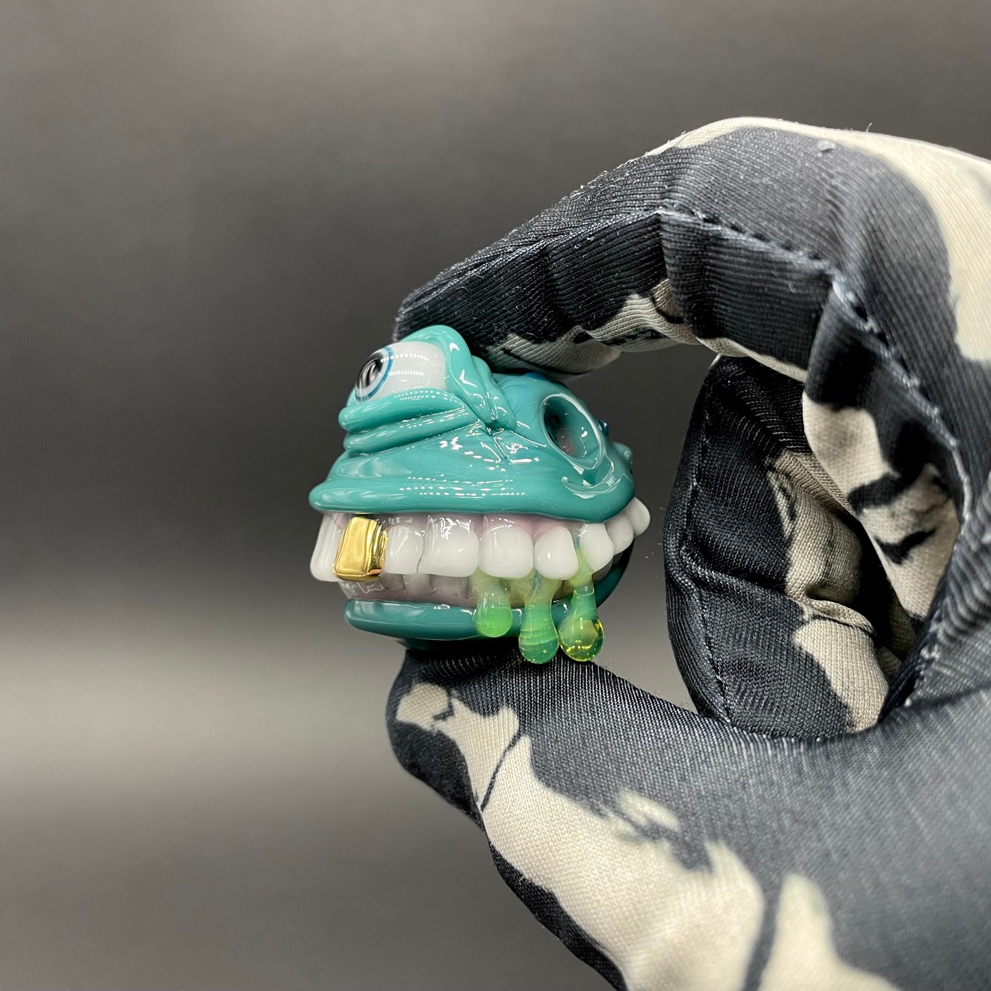 Grinning like a fool glass pendant