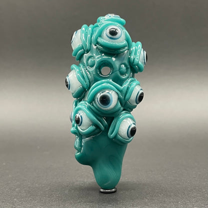 The Never-Blinking One glass effigy pendant