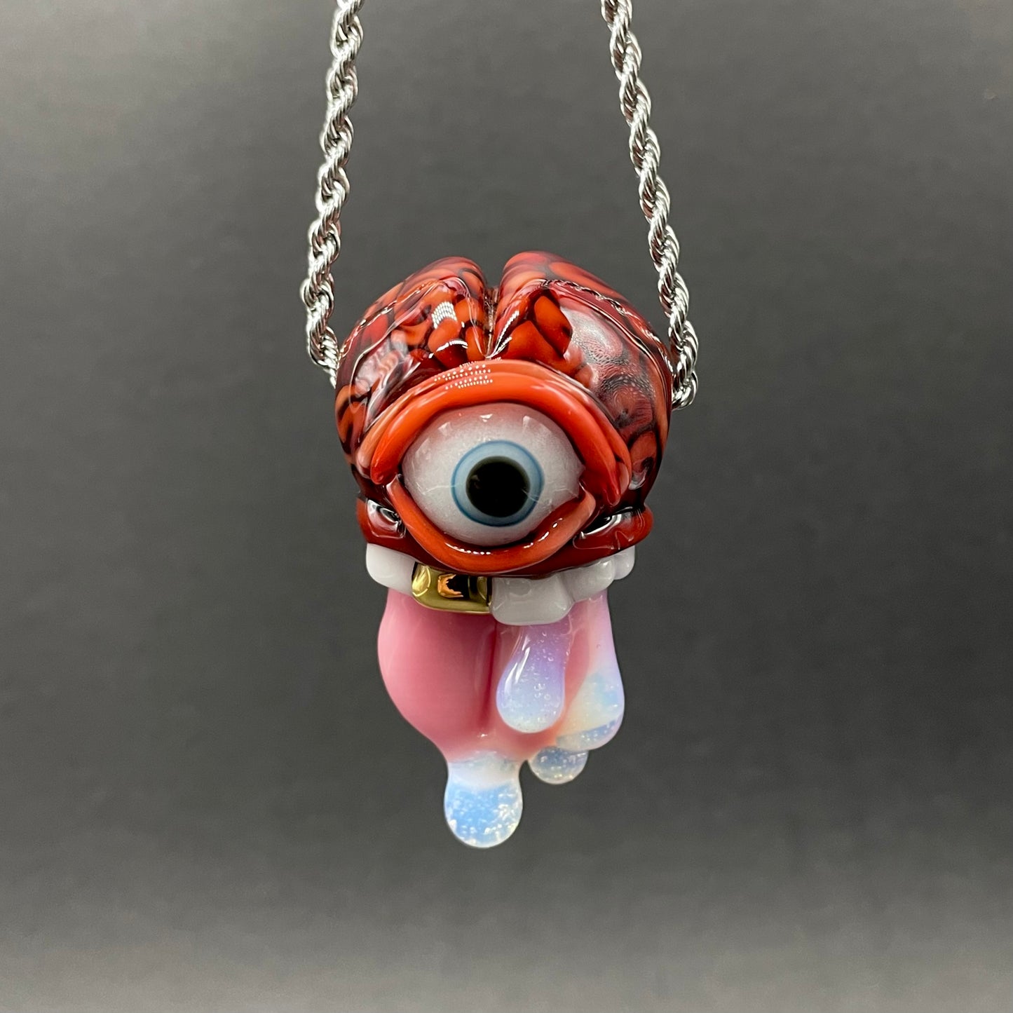 Mastermind glass pendant