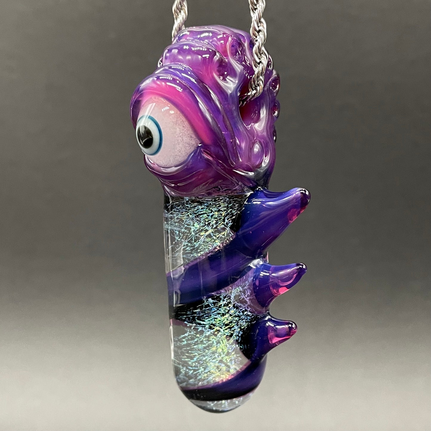 Royal jelly dichroic cyclops pendant detail view - premium glass art