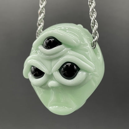 Time manipulating three eye glass alien pendant
