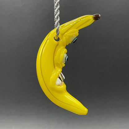Grinning glass banana pendant
