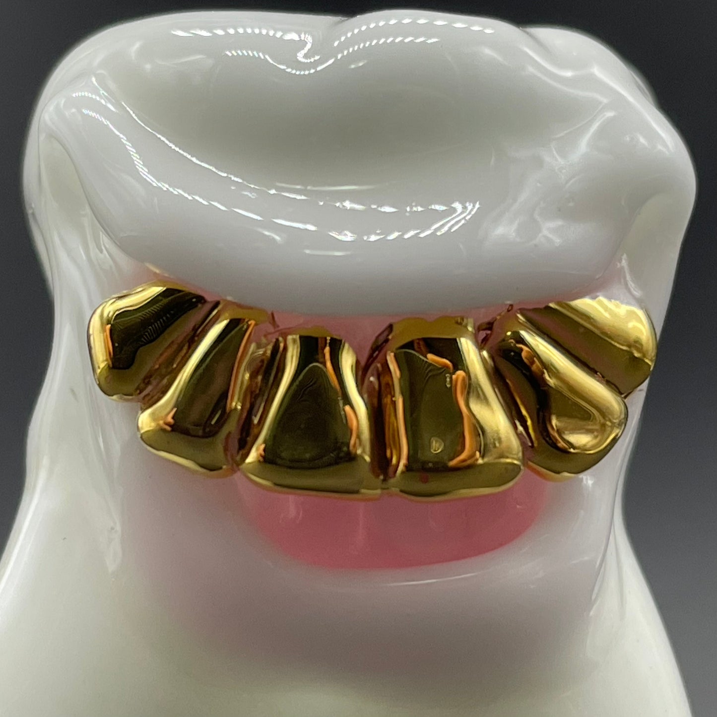 Tooth ache glass pendant