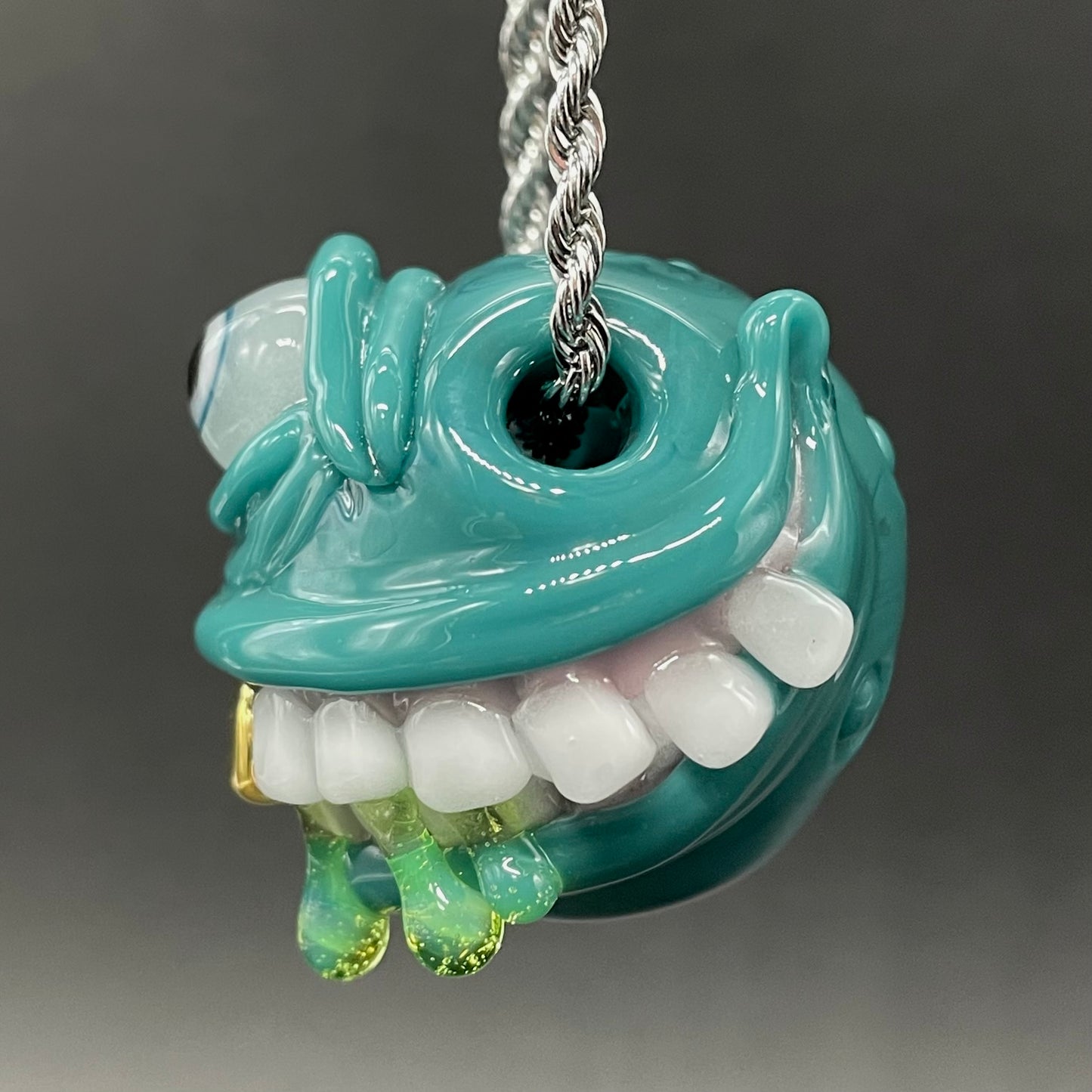 Grinning like a fool glass pendant