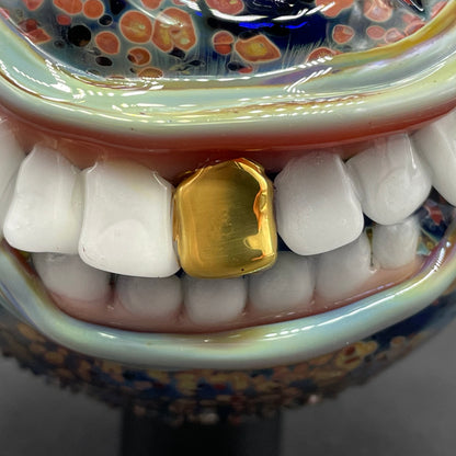 Smiling cyclops ornament