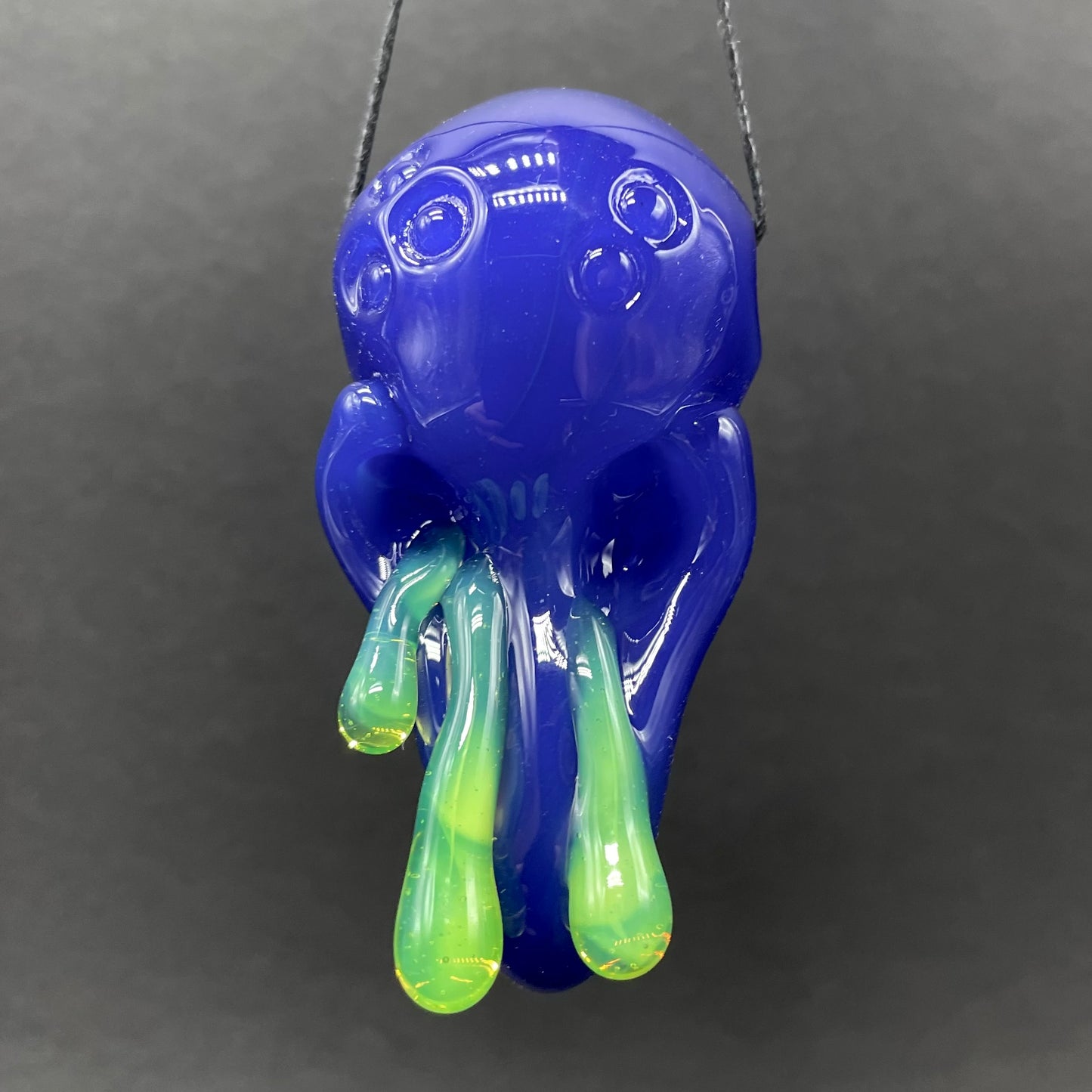 running nose glass pendant