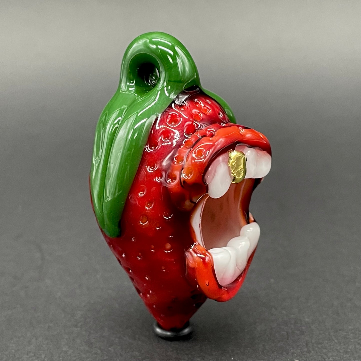 Screaming strawberry glass pendant