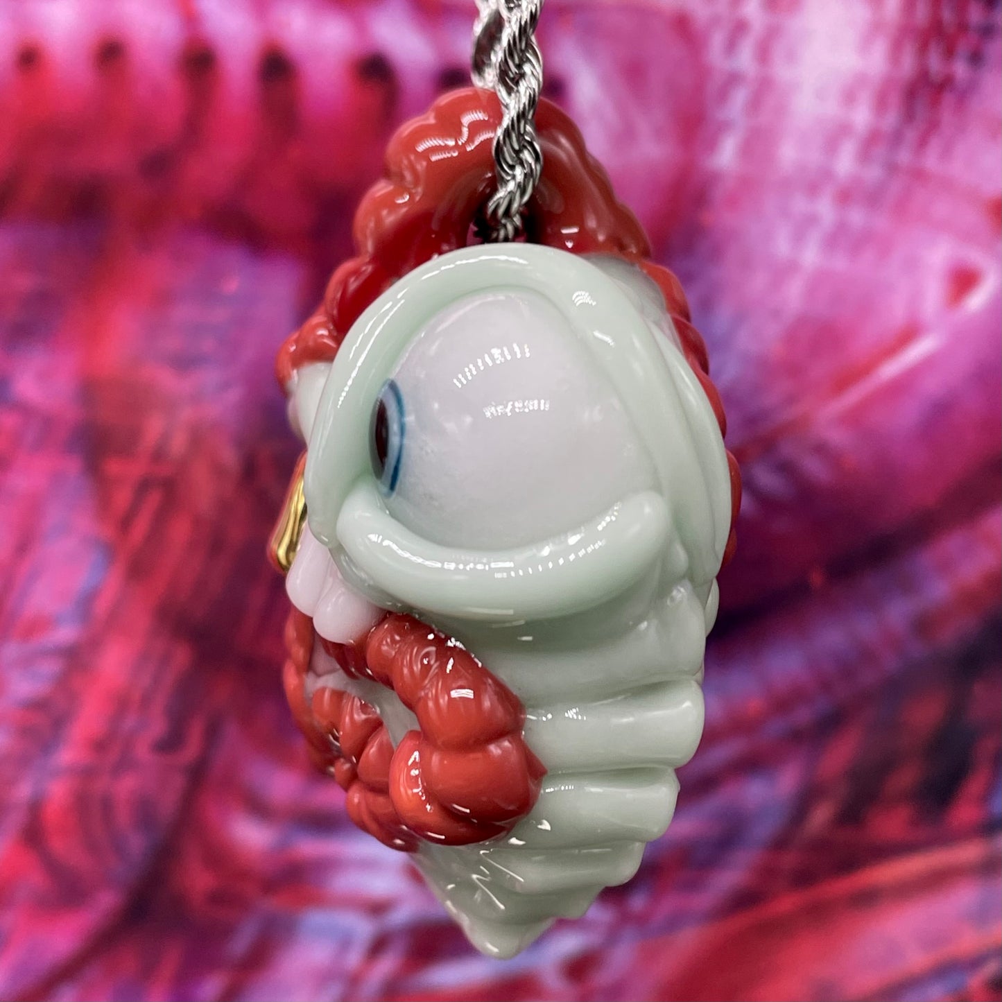 Worm eater pendant