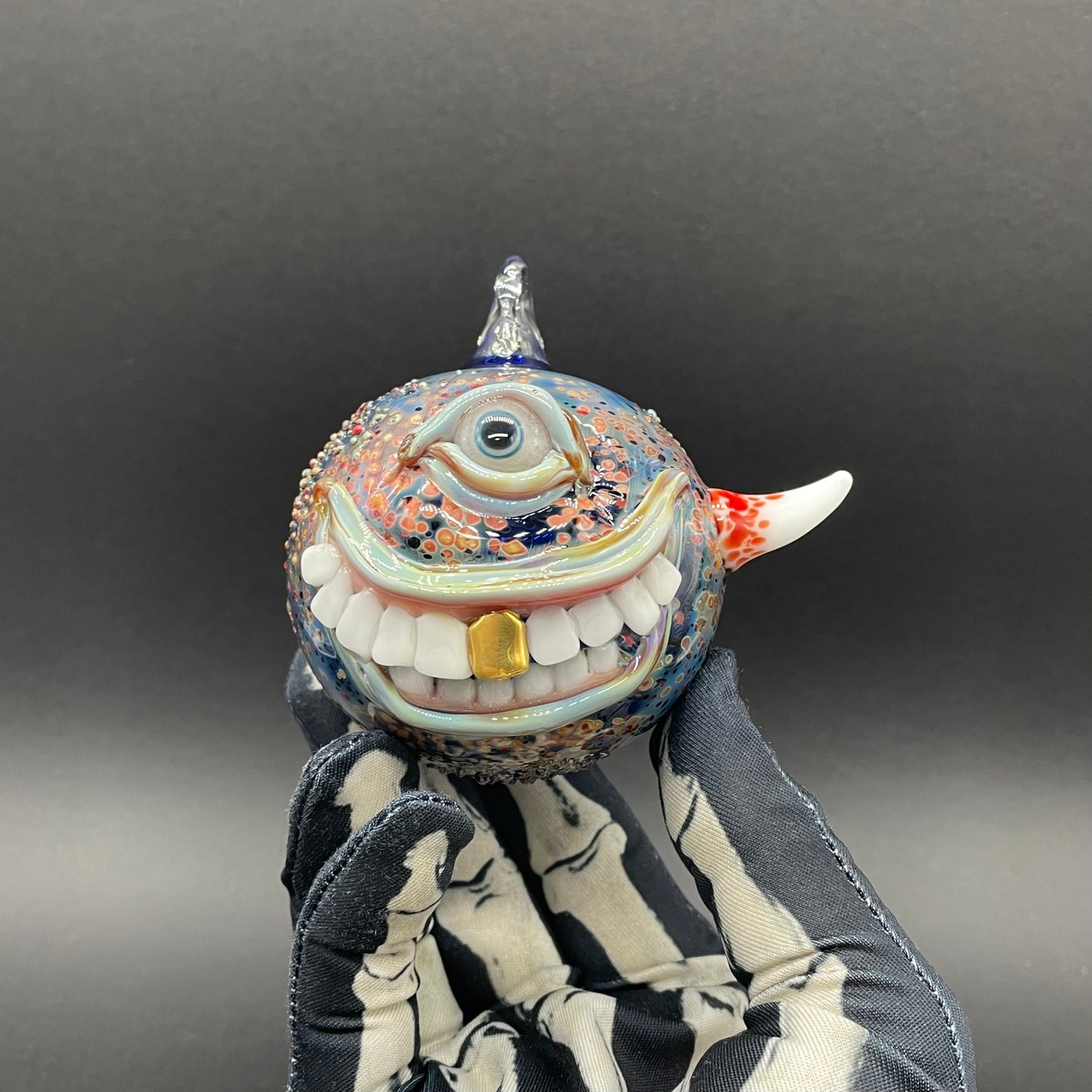 Smiling cyclops ornament