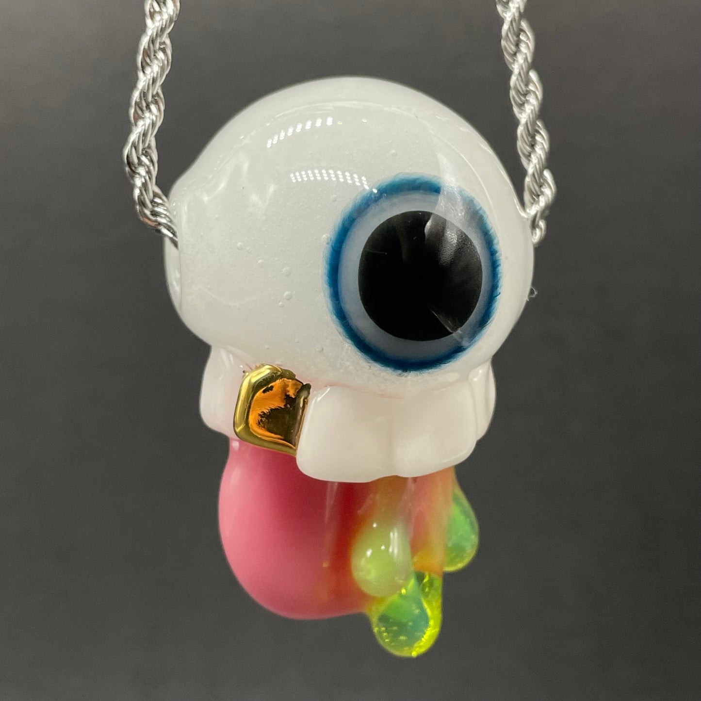 Glow in the dark eye pendant